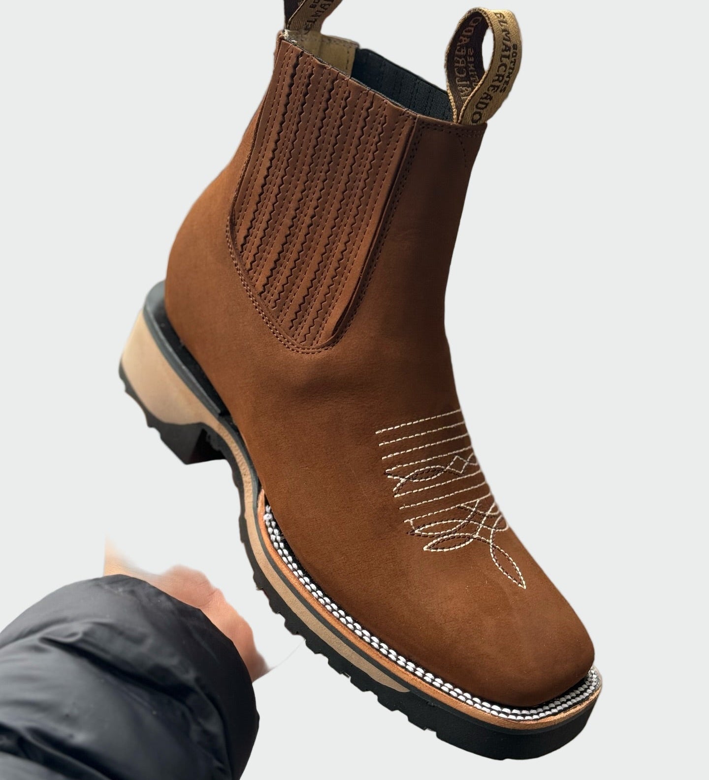 Botas de cowboy em pele